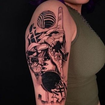 Blackwork tattoo on an upper arm